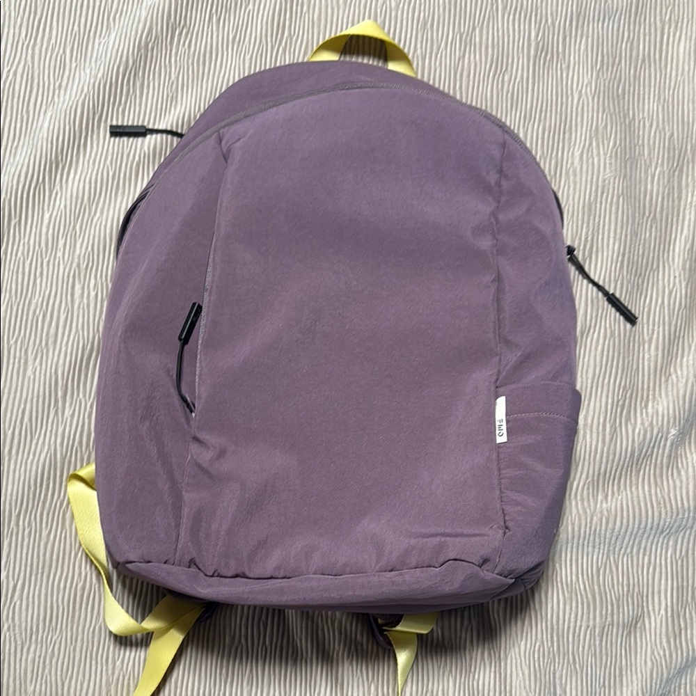 Stylish Purple Backpack with Yellow Accents